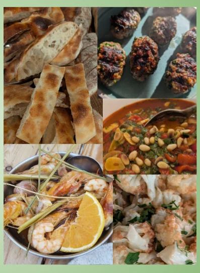 A spread of dishes including flatbread, prawns and a bean stew